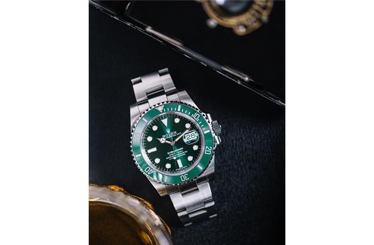 rolex daytona yellow gold green dial