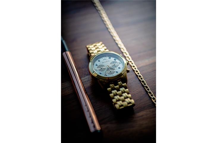 rolex green face gold